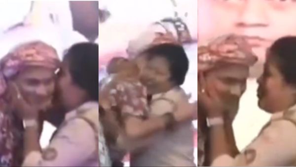 सिंगर को देख खुद को रोक नहीं पाई वर्दी में तैनात महिला, स्टेज पर चढ़कर लगाया गले और फिर किया जोरदार किस