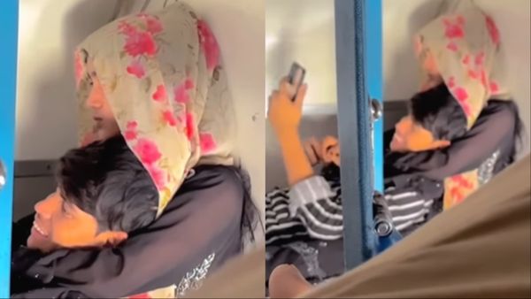 Viral Video: ट्रेन की एक ही सीट पर कपल हो रहा था रोमांटिक, सामने बैठे शख्स ने बनाया वीडियो और कर दिया वायरल