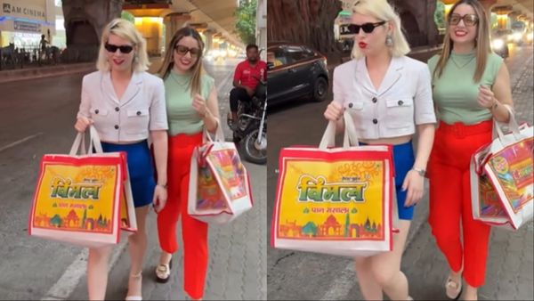 Viral Video: विदेशी ब्रांड छोड़ देसी झोले लेकर घूम रहीं विदेशी हसीनाएं, विमल पान मसाला के बैग...
