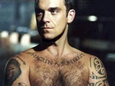 Robbie Williams spotted dressed as a gorilla!