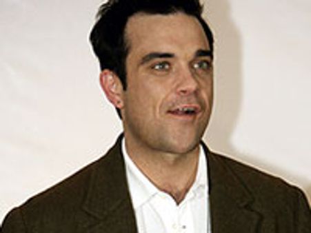 Robbie Williams writes alien anthems at UFO camp