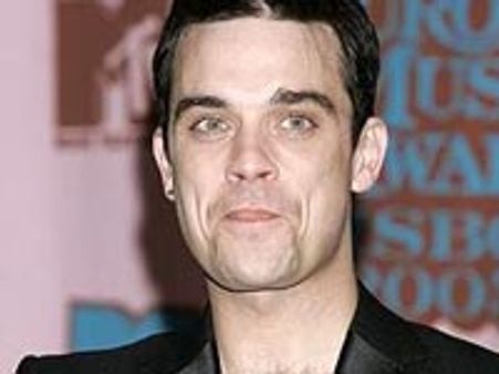 Robbie's girl pal worried over country pad