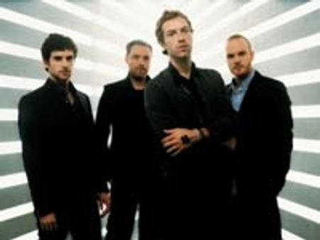 Coldplay scribble notes on walls and instruments