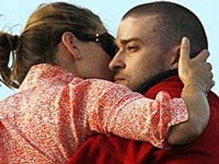 Justin Timberlake gets a kiss from girlfriend