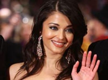 Ash gives a glimpse of her cleavage