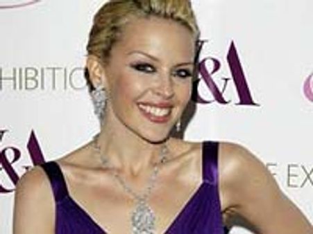 Kylie Minogue invites tarot reader to Blue sets