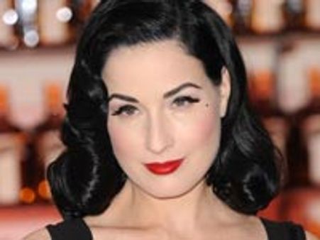 Dita Von Teese grateful to tattoo artist