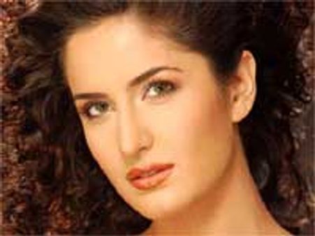 Katrina tattoos on her chest