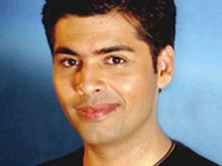 Karan flying off to San Francisco with Shahrukh