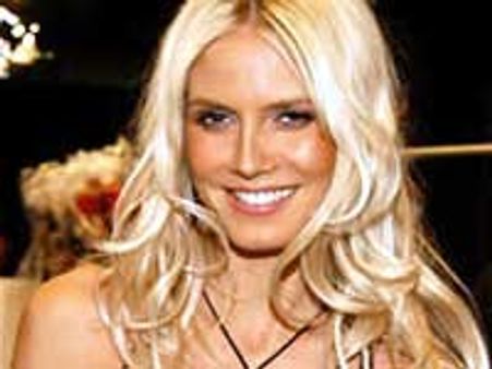 Heidi Klum strips on Ellen Degeneres' show