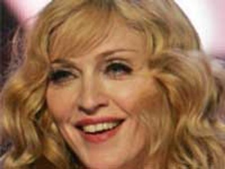 Madonna hires English tutor for lover Jesus Luz
