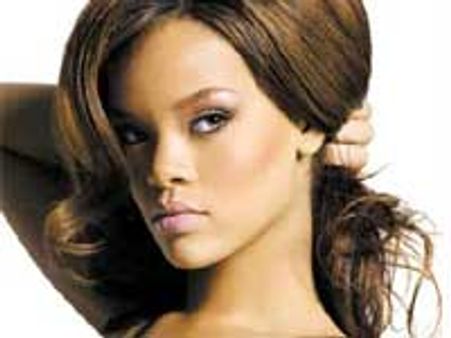 Rihanna shows off her cleavage