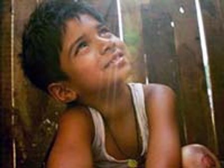 Slumdog Millionaire kid found among the debris