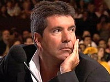 Cowell's dark moods make him feel miserable