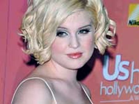 Kelly Osbourne sports blonde cropped hairstyle