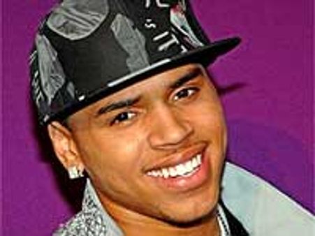 Chris Brown trying to postpone assault case