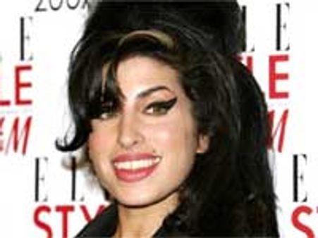 Parents says Winehouse is killing herself