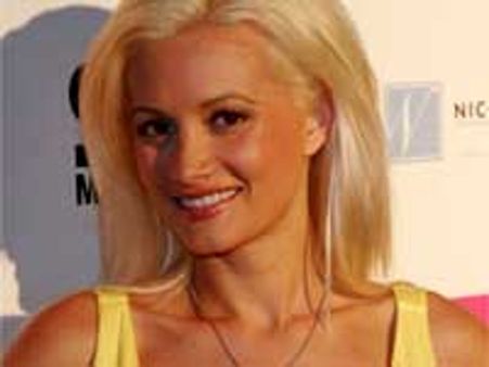 Criss dates a different person every week, says Holly