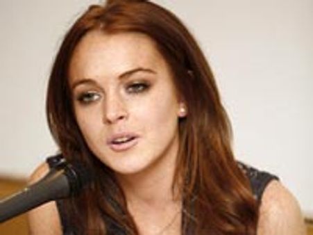 Lindsay Lohan brands herself workaholic