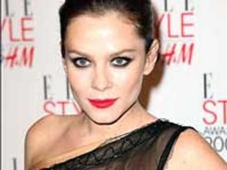 Anna Friel seen in a breast exposing dress