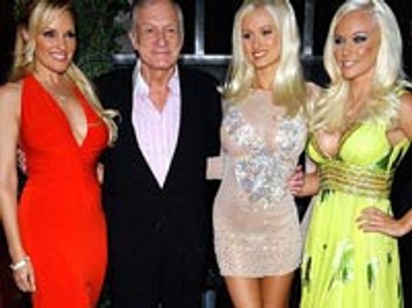Hefner's ex-girlfriends enjoy naked shower