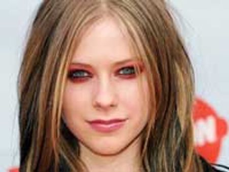 Avril split from hubby as she too young for wedlock