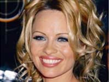 Pamela gets back into Baywatch swimsuit