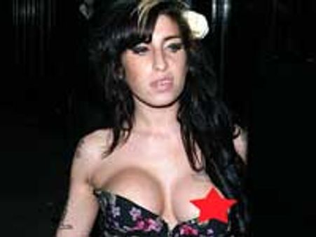 Amy Winehouse's new obsession – boob job