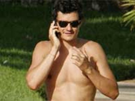 Orlando Bloom goes topless in public