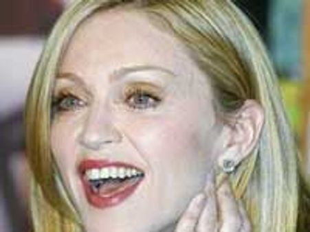 Madonna calls daughter a show girl