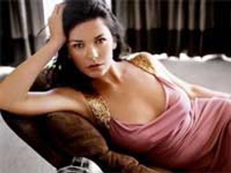 Catherine Zeta-Jones flashes boobs on Broadway stage