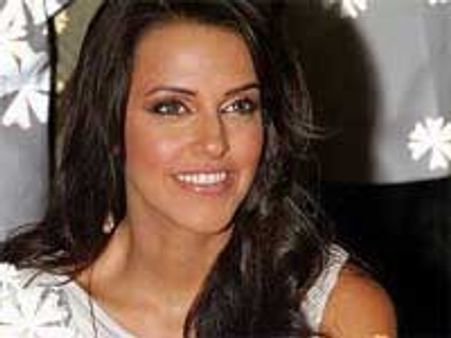 Neha Dhupia is a flirtatious seductress
