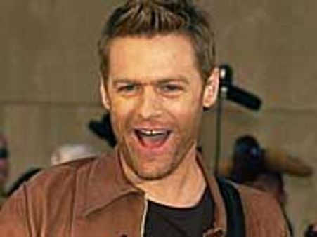 Bryan Adam shoots Sting for hearing campaign