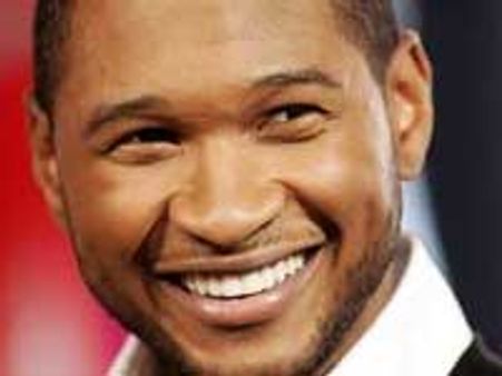 Usher tops UK singles chart
