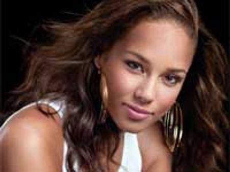 Alicia Keys gifts black Cadillac to mom on 60th birthday