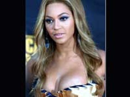 Beyonce Knowles' nipple snips out of her swimsuit