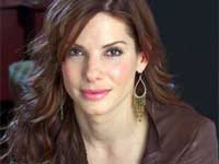 Sandra Bullock secretly adopts baby boy, files for divorce