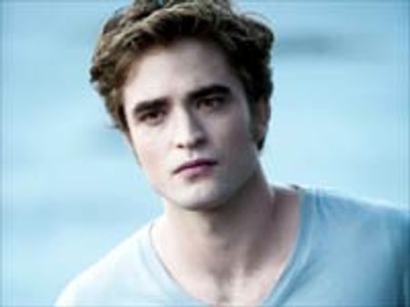 Robert Pattinson admits fans help him check his schedule