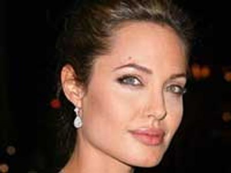 Angelina Jolie to adopt child from Haiti