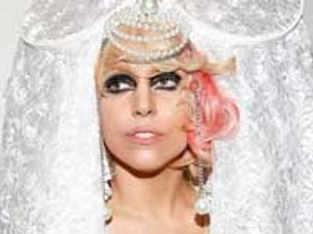 Lady Gaga poses as a man for mag