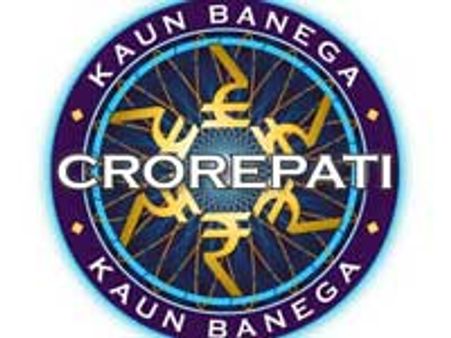 Amitabh adds the new rupee symbol to KBC logo