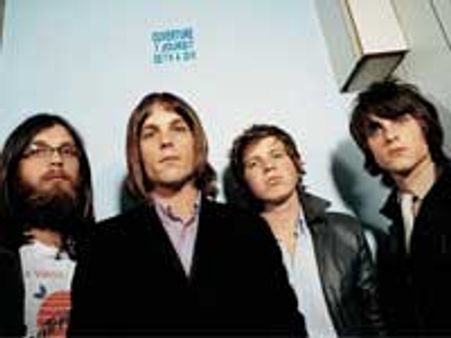 Kings Of Leon cancel gig after pigeon poops in bassist's mouth