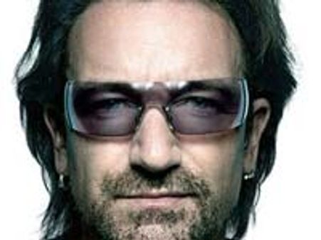 Bono makes comeback on stage after back surgery