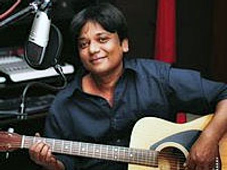 Pravin tuning background score for Chikku Bukku