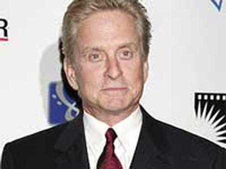 Michael Douglas vows not to succumb to his cancer