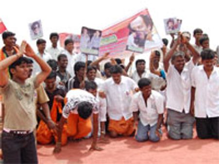 Rajinikanth fans climb hill on knees