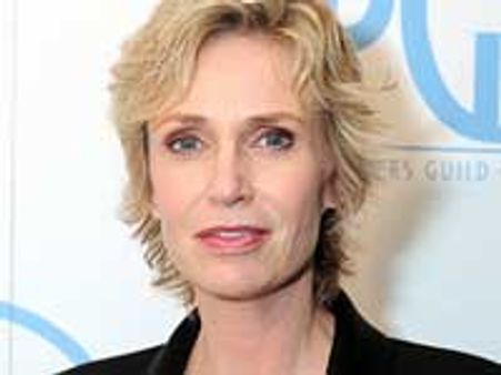Glee star Jane Lynch strips naked on live TV