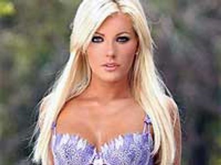 Hugh Hefner's fiancee shows off shiny engagement ring