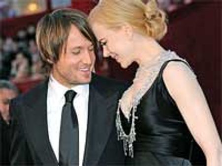 Nicole, Keith show off pics of their new baby girl