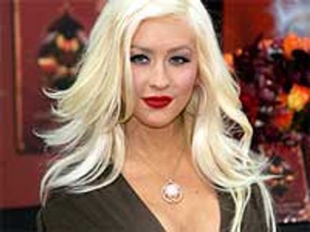 Christina Aguilera gets support from Fergie